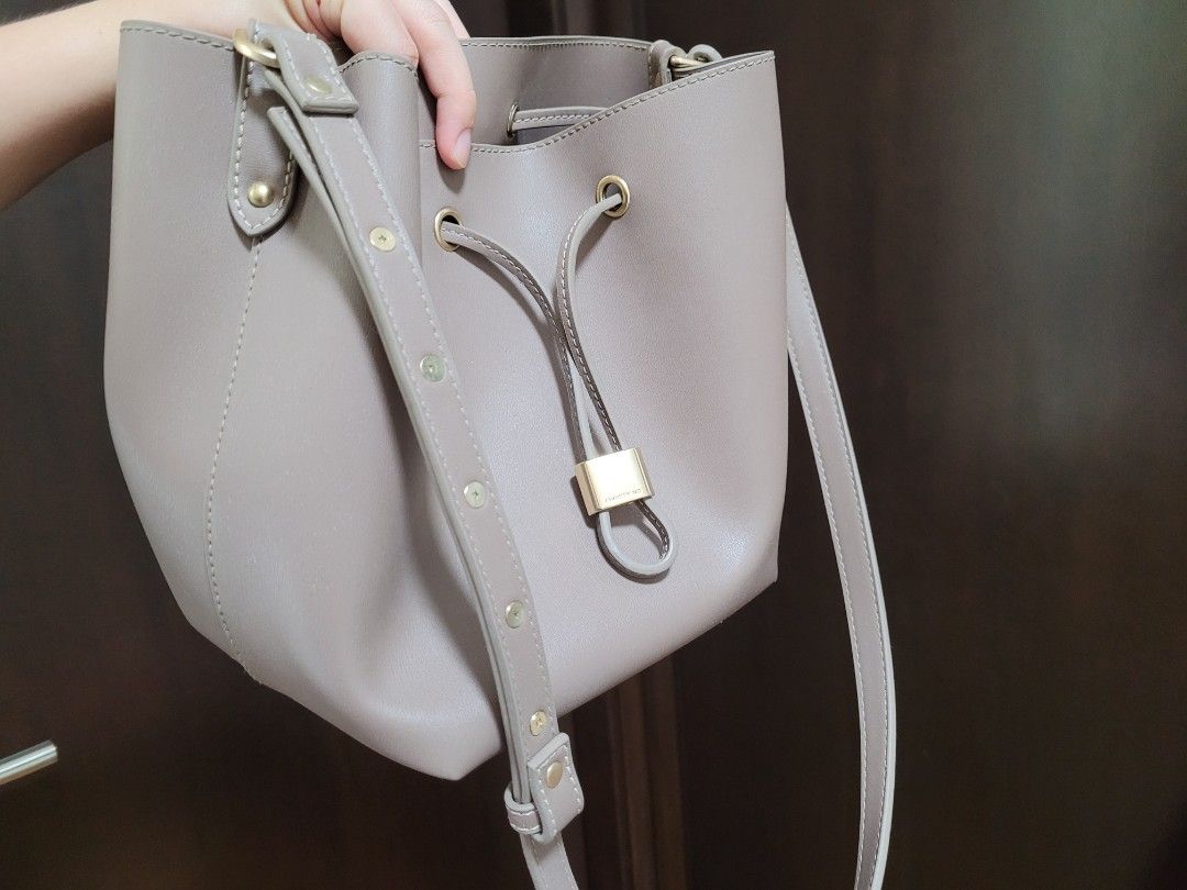 Christy Ng beige bucket bag