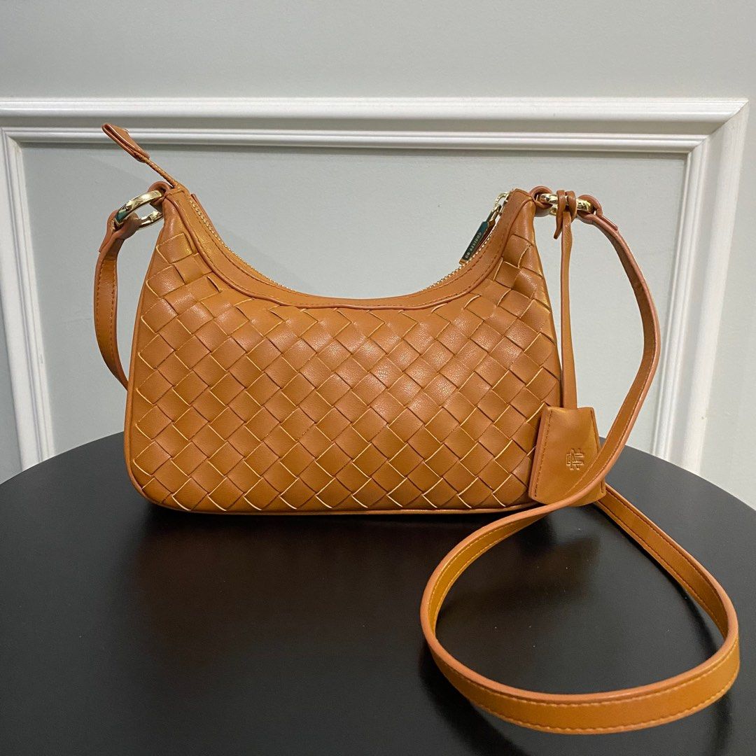 ChristyNg.com - The Silvia woven hobo bag is made from