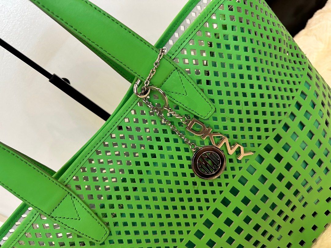 DKNY Tote bag Green (Category: Luxury Bags & Wallets) located in Pasig City. Submitted by closetqueen8888 (Listing ID 1232133338, Image 2). Description: DKNY Green tote bag Like New With attached pouch inside Perfect beach bag 😍 Price: 5,500 + SF.