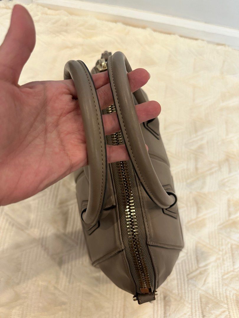 Givenchy Antigona Medium Taupe (Category: Luxury Bags & Wallets) located in Pasig City. Submitted by closetqueen8888 (Listing ID 1232118328, Image 2). Description: Givenchy Antigona Size: Medium Color: Taupe Inclusions: Dustbag Measurements are: Handle Drop: 9cm / 3.5in Depth: 19cm / 7.5in Max. Strap Length: 76cm / 29.9in Height: 27cm / 10.6in Width: 33cm / 13in Price: 17,000 + SF.
