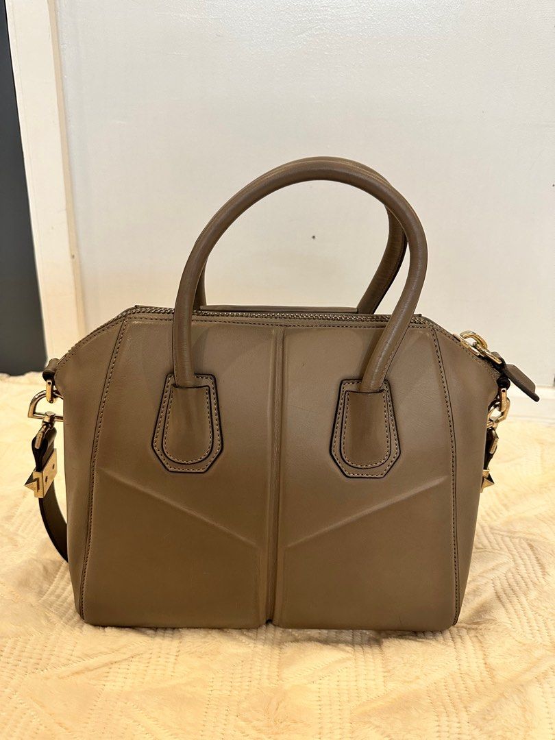 Givenchy Antigona Medium Taupe (Category: Luxury Bags & Wallets) located in Pasig City. Submitted by closetqueen8888 (Listing ID 1232118328, Image 3). Description: Givenchy Antigona Size: Medium Color: Taupe Inclusions: Dustbag Measurements are: Handle Drop: 9cm / 3.5in Depth: 19cm / 7.5in Max. Strap Length: 76cm / 29.9in Height: 27cm / 10.6in Width: 33cm / 13in Price: 17,000 + SF.