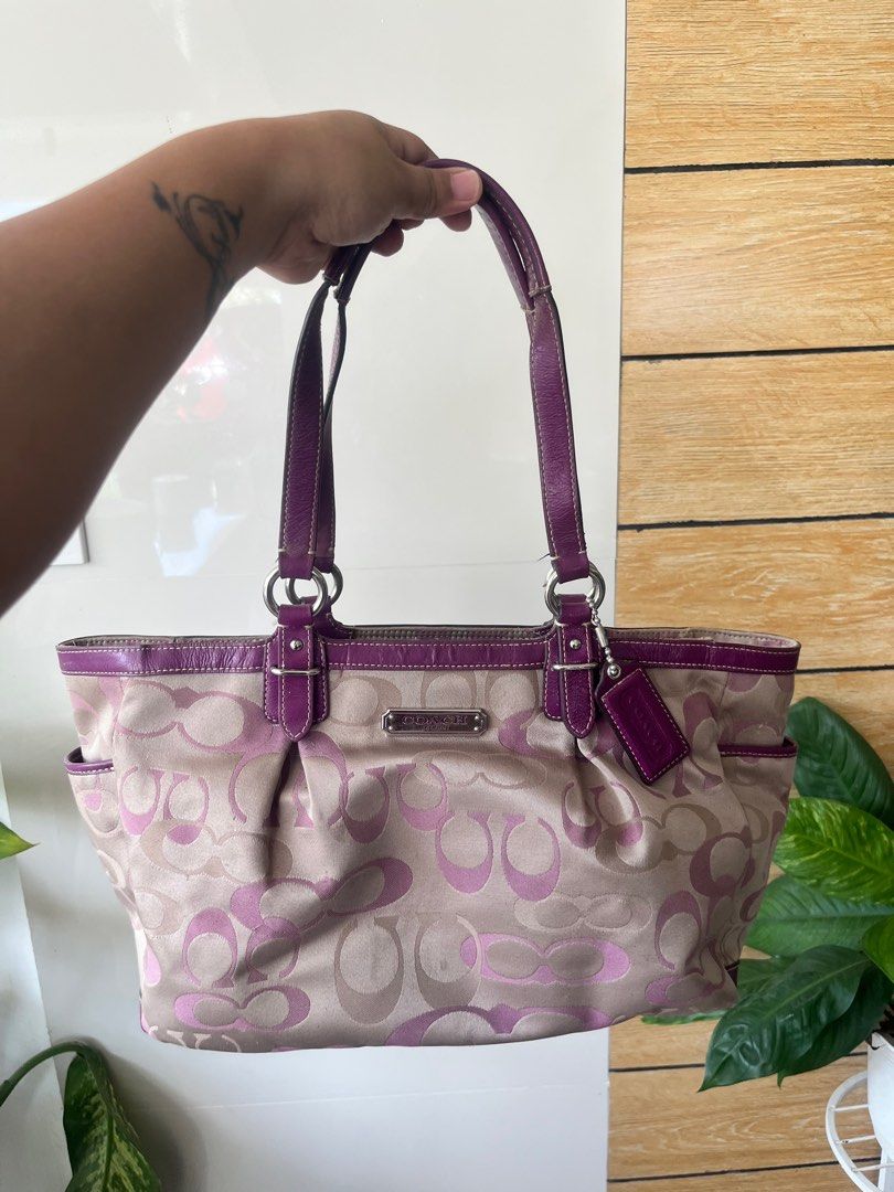 Preloved coach shoulder bag purple (Category: Luxury Bags & Wallets) located in Piat. Submitted by jambydesignshoppe (Listing ID 1231975996, Image 1). Description: What you see is what you get original coach bag preloved purple color canvass design Flaws as seen on the pictures slightly negotiable for the price.