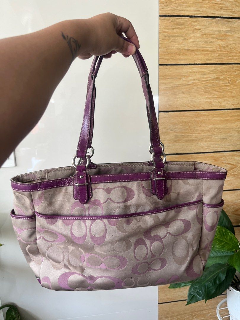 Preloved coach shoulder bag purple (Category: Luxury Bags & Wallets) located in Piat. Submitted by jambydesignshoppe (Listing ID 1231975996, Image 2). Description: What you see is what you get original coach bag preloved purple color canvass design Flaws as seen on the pictures slightly negotiable for the price.