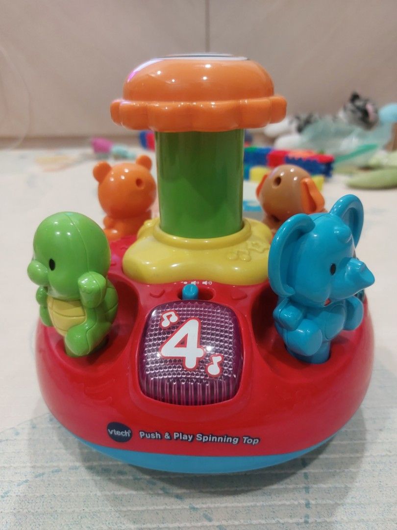 Push Nplay VTECH Push N Play Spinning Top, Babies & Kids, Infant Playtime on Carousell