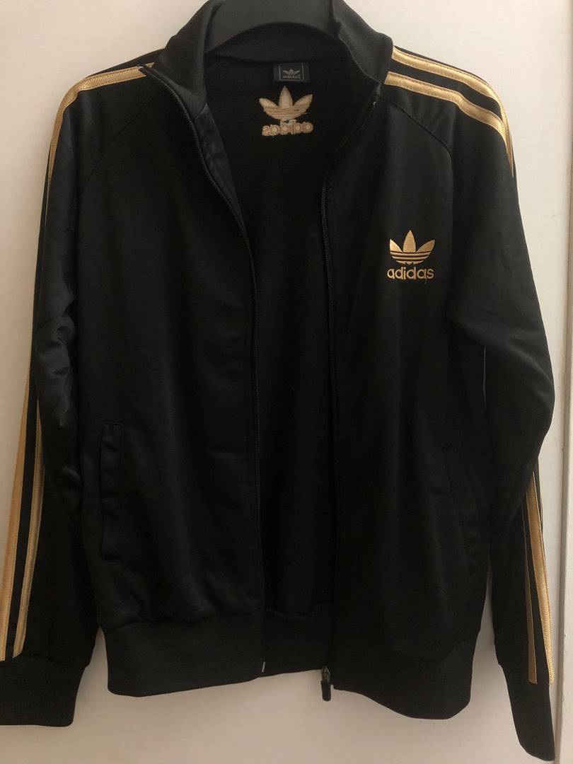Black and top gold jacket adidas