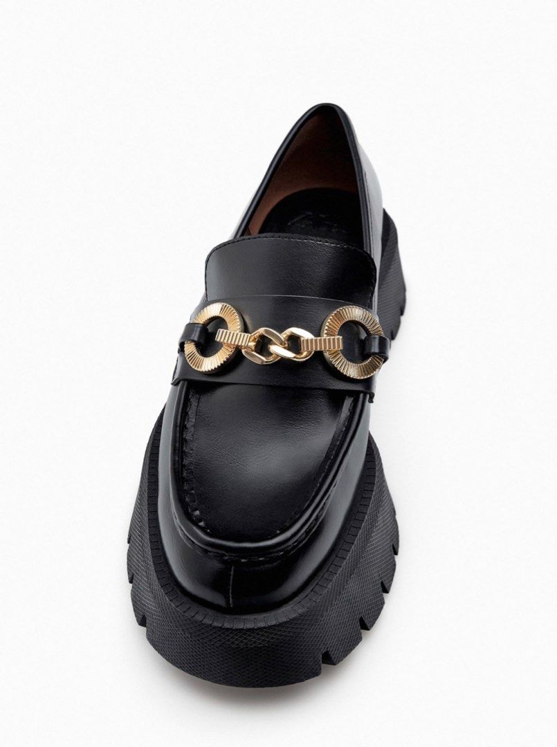 Black Chunky Platform Loafers with Chain (Zara) (Category: Loafers) located in Manila. Submitted by unacore (Listing ID 1232218024, Image 2). Description: Bought from Zara at PHP3,495. Used only once at Harry Styles’ Concert. Has some slight creases but still in really good condition! Size is Women’s EU 40, heel height is 1’9 inches. (Im usually a size 9 and it fits me perfectly). Price negotiable DM me your offers! Comes with Zara dustbag and bo