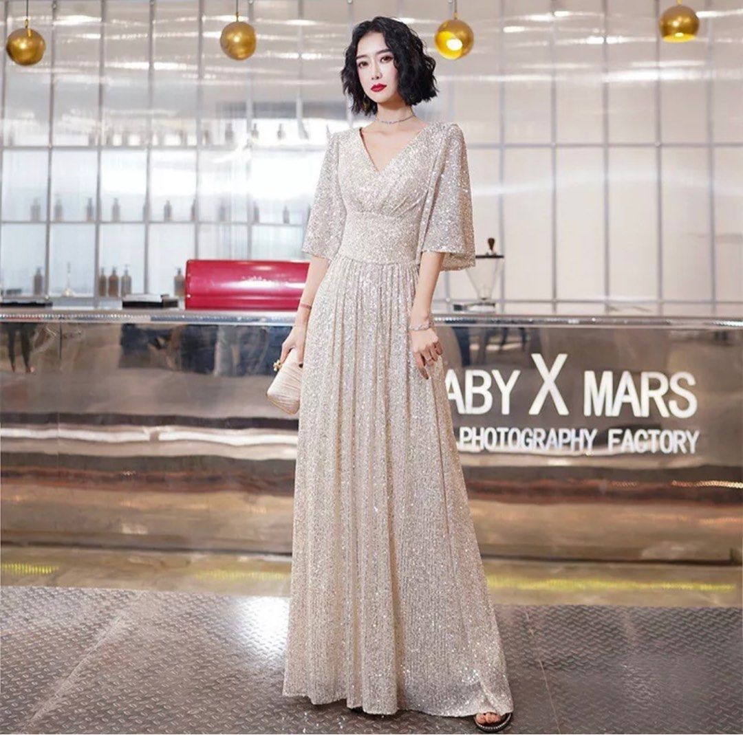 Gold evening hotsell gowns with sleeves