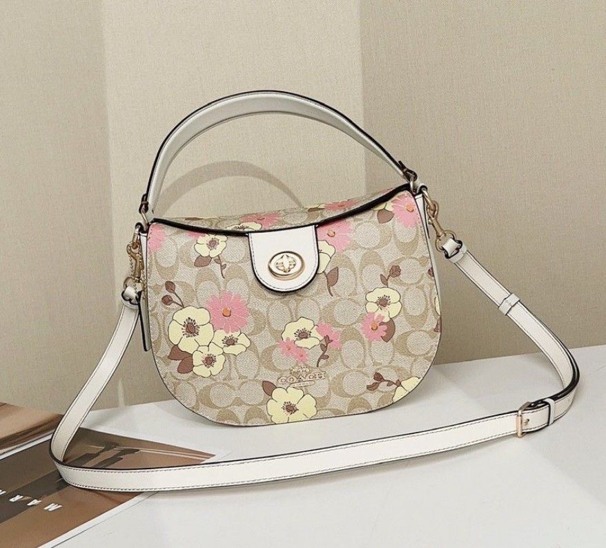 Coach ELLA hobo (Category: Luxury Bags & Wallets) located in Las Pinas. Submitted by yhn_boutique (Listing ID 1232231316, Image 1). Description: New arrival 👜 Actual pic posted 📌Cash on delivery via lalamove/grab 📌J&T pay today ship today 📌complete inclusions pls: visit my page & carousell acct for peace of mind TY! 🛍️ DISCLAIMER: not affiliated or endorsed with any of the brands featured on this page. All copyrights and trademarks belong to