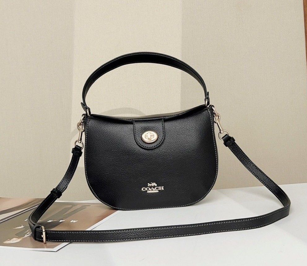 Coach ELLA HOBO 👜 (Category: Luxury Bags & Wallets) located in Las Pinas. Submitted by yhn_boutique (Listing ID 1232230179, Image 1). Description: New arrival 👜 Actual pic posted 📌Cash on delivery via lalamove/grab 📌J&T pay today ship today 📌complete inclusions pls: visit my page & carousell acct for peace of mind TY! 🛍️ DISCLAIMER: not affiliated or endorsed with any of the brands featured on this page. All copyrights and trademarks belong