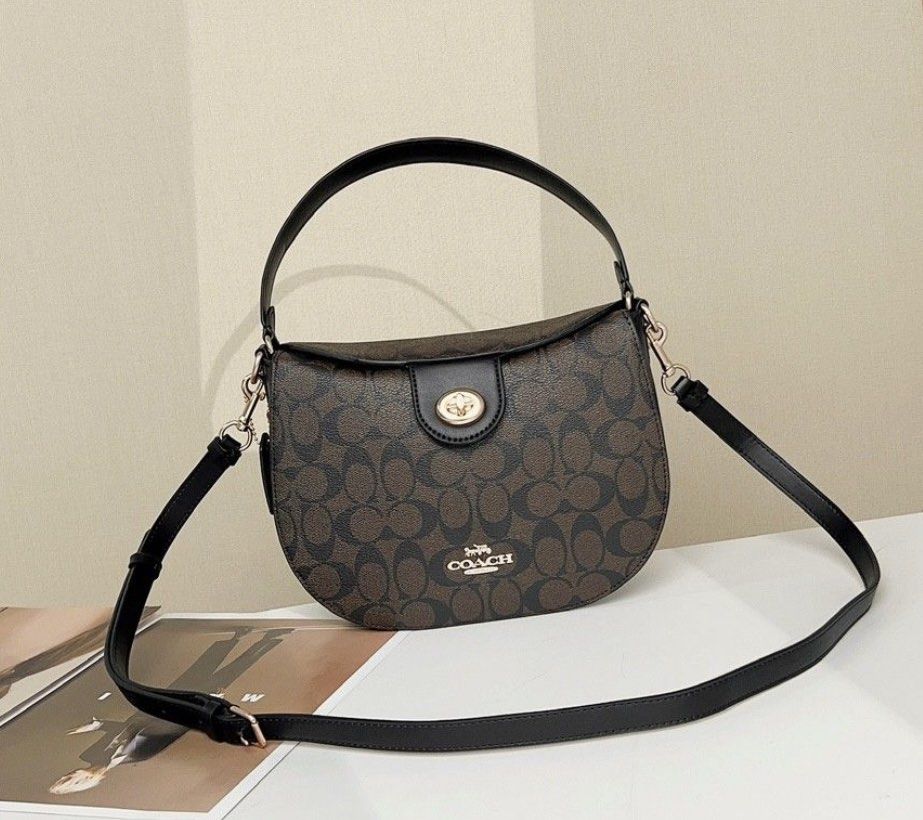 Coach ELLA Hobo 👜 (Category: Luxury Bags & Wallets) located in Las Pinas. Submitted by yhn_boutique (Listing ID 1232230841, Image 1). Description: New arrival ♥️ Actual pic posted 📌Cash on delivery via lalamove/grab 📌J&T pay today ship today 📌complete inclusions pls: visit my page & carousell acct for peace of mind TY! 🛍️ DISCLAIMER: not affiliated or endorsed with any of the brands featured on this page. All copyrights and trademarks belong