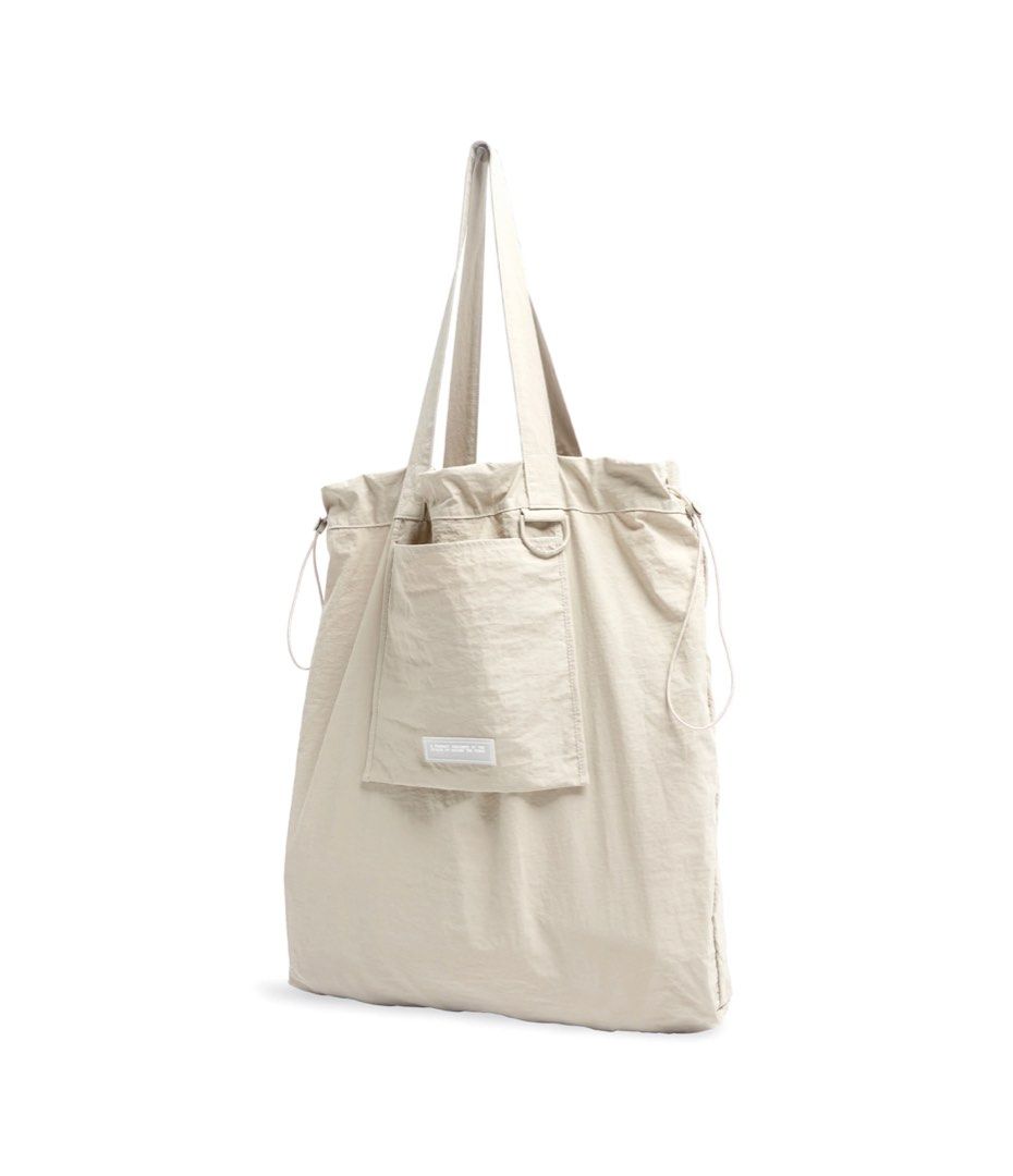 Drawstring Toggle Tote (Category: Tote Bags) located in Singapore. Submitted by mochiwhat (Listing ID 1232178002, Image 1). Description: Bought it for $79, selling it for $65. No lowball please.