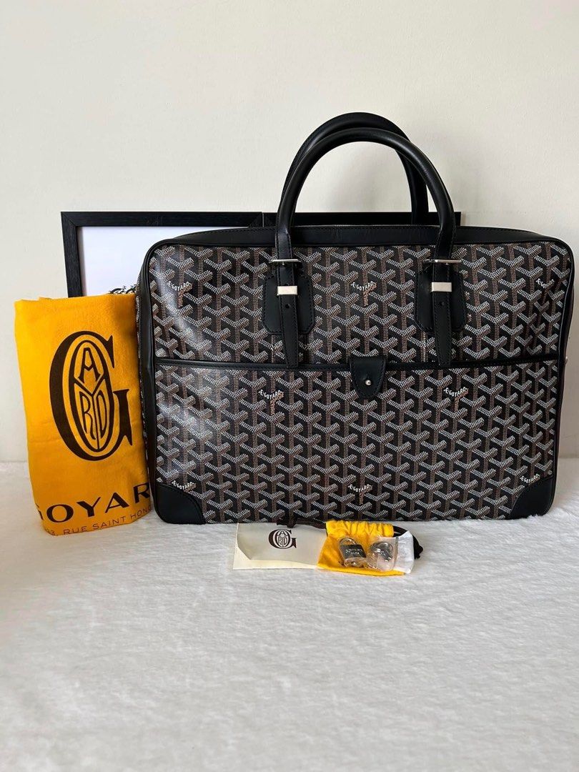 Goyard Black Ambassade MM Document Bag (Category: Luxury Bags & Wallets) located in Manila. Submitted by bagislifeshop (Listing ID 1232201803, Image 1). Description: ▪️Goyard Black Ambassade MM Document Bag▪️ ☑️Available in Pampanga ✅Condition: 8.5/10 ✅Colour: Black in SHW ✅Material: Goyardine Canvas & Chevron Calfskin ✅Dimensions: 41 x 29 x 10cm ✅Inclusions: Dust bag, lock and keys .