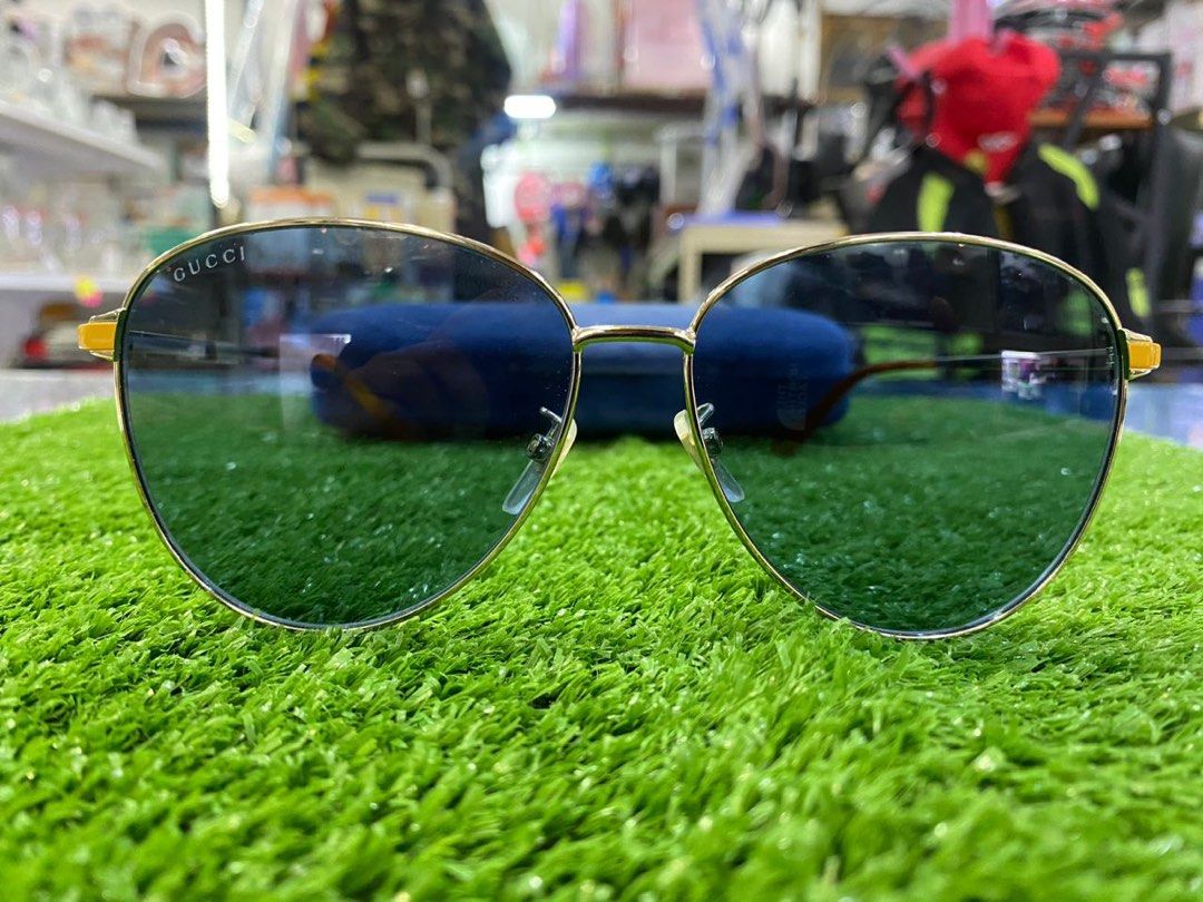 Gucci sunglasses reflective 2025