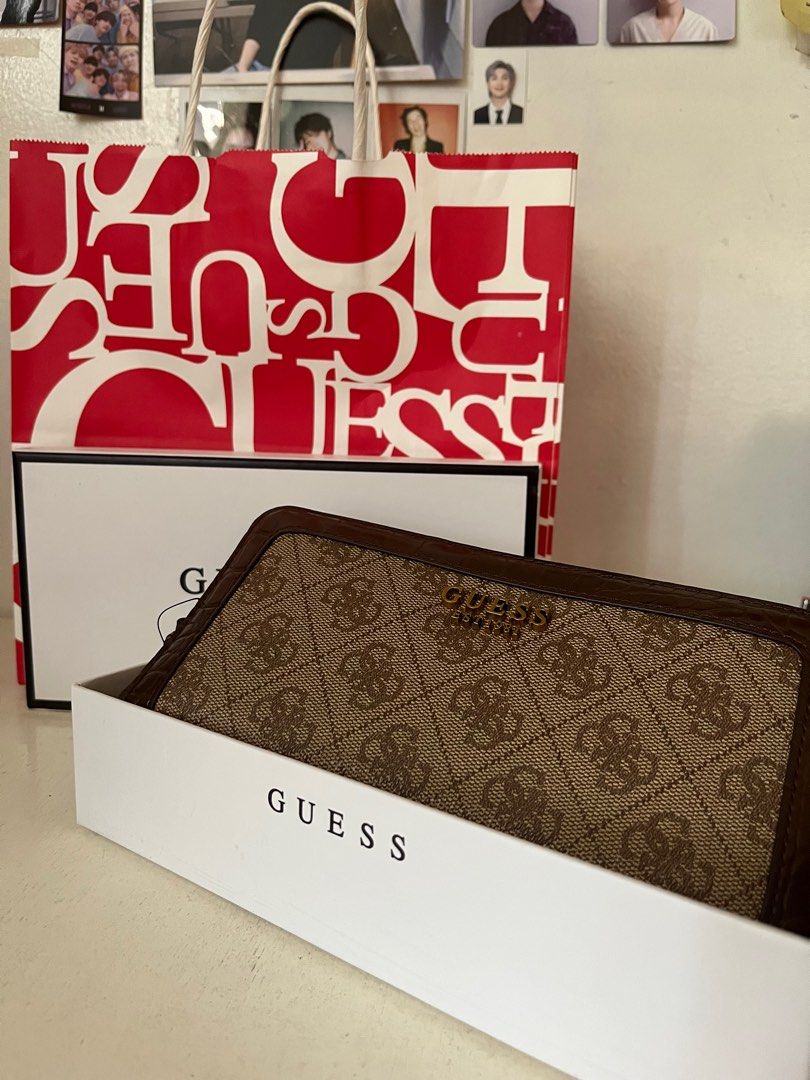 GUESS Brown Long Wallet (Category: Luxury Bags & Wallets) located in San Pedro. Submitted by cayerms (Listing ID 1232154773, Image 2). Description: Size : 8 in L x 4 in W x 1 in thk. Brand new Rfs : Regalo lang di nagagamit.