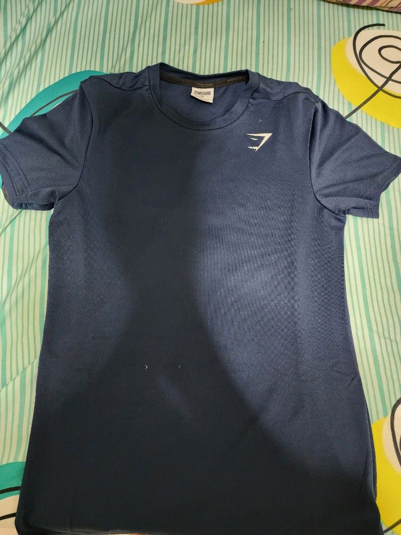 Gymshark arrival t-shirt Navy Blue, Men's Fashion, Tops & Sets, Tshirts &  Polo Shirts on Carousell