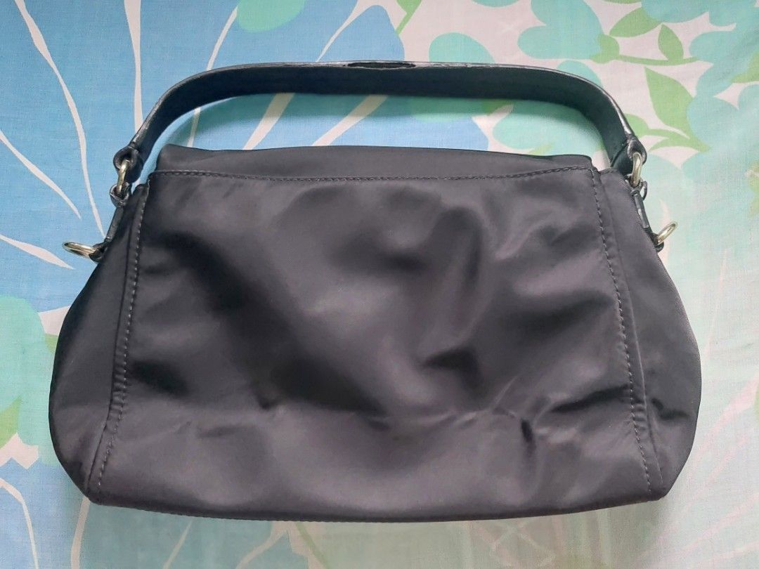 Kate Spade (Category: Luxury Bags & Wallets) located in Valenzuela. Submitted by trislndgn (Listing ID 1232237932, Image 2). Description: Kate Spade Miri Nylon Crossbody Bag Like new, only flaw lang is sa handle but very minimal lang, pwedeng lagyan ng twilly, or ipagawa kay mr quickie 🙂 Steal price for 2600, original price around 7k, see last photo for the flaw! 🙂.