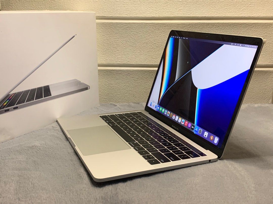 MacBook Pro touchbar 2019 8/128 13-inch Complete package with box same serial. (Category: Laptops & Notebooks) located in San Juan City. Submitted by Gadgetseller___ (Listing ID 1232268409, Image 2). Description: MacBook Pro touchbar 2019 8/128 13-inch Complete package with box same serial. Condition - Used Proccesor : 1.4 GHz Quad-Core Intel Core i5 Memory : 8 GB RAM Graphics : Intel Iris Plus Graphics 645 1536 MB Storage : 128 GB SSD Color : Si