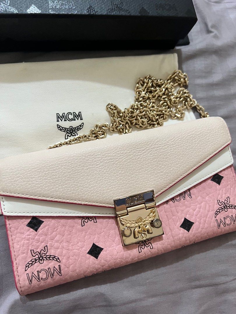 MCM wallet on chain (Category: Luxury Bags & Wallets) located in Las Pinas. Submitted by chrizzellebernardino (Listing ID 1232224914, Image 3). Description: 100% authentic; moneyback guaranteed if proven fake JAPAN source Comes with authenticity card, dustbag, box, paperbag .