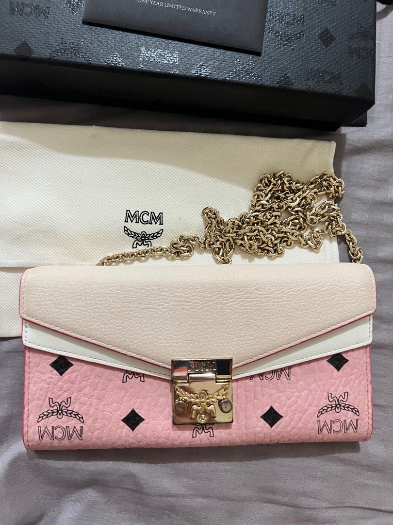 MCM wallet on chain (Category: Luxury Bags & Wallets) located in Las Pinas. Submitted by chrizzellebernardino (Listing ID 1232224914, Image 2). Description: 100% authentic; moneyback guaranteed if proven fake JAPAN source Comes with authenticity card, dustbag, box, paperbag .