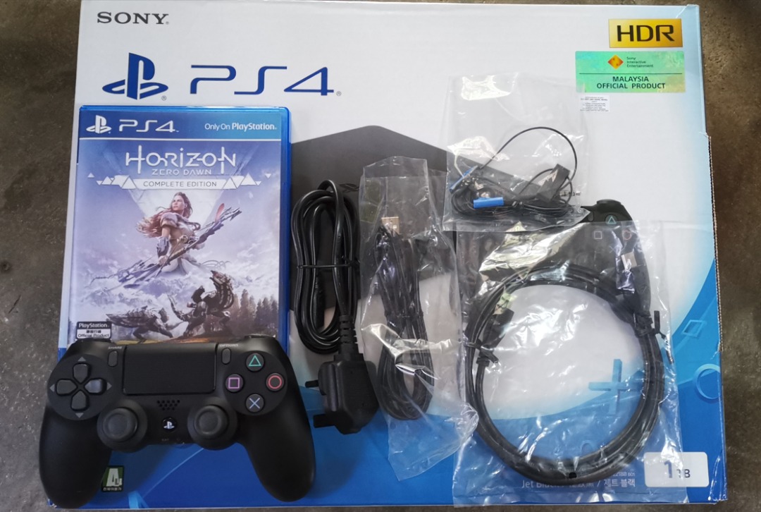 PlayStation 4 1TB Model2023 with WWE2K23 Under Warranty Used Set