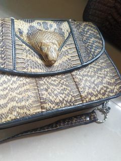 Rare snakeskin bag with real cobra head