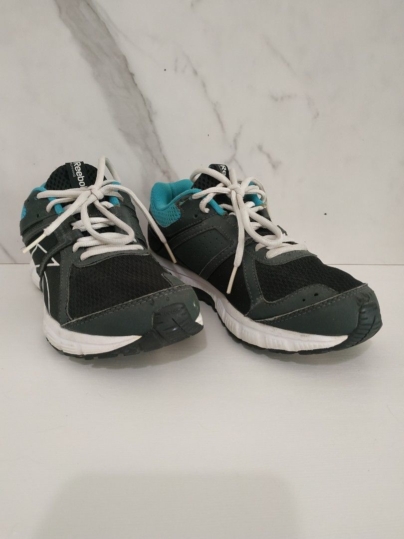 Reebok Smooth Flex Flyer Women s Fashion Footwear Sneakers on