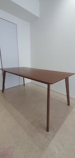 BROWN WOODEN DINING TABLE