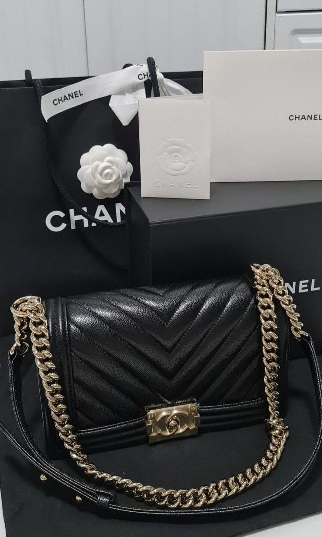 CHANEL Caviar Boy Old Medium full set (Category: Bags & Wallets) located in Singapore. Submitted by shoppieq (Listing ID 1232438971, Image 1). Description: New Condition year Dec 2021 microchipped chanel caviar model. Will provide a bag shaper and insert/organiser Bought locally at MBS ( no receipt kept) Champagne light gold hardware comes chanel original box, dust bag, paper bag, auth card. entrupy cert will be provided upon finalised purchase. 