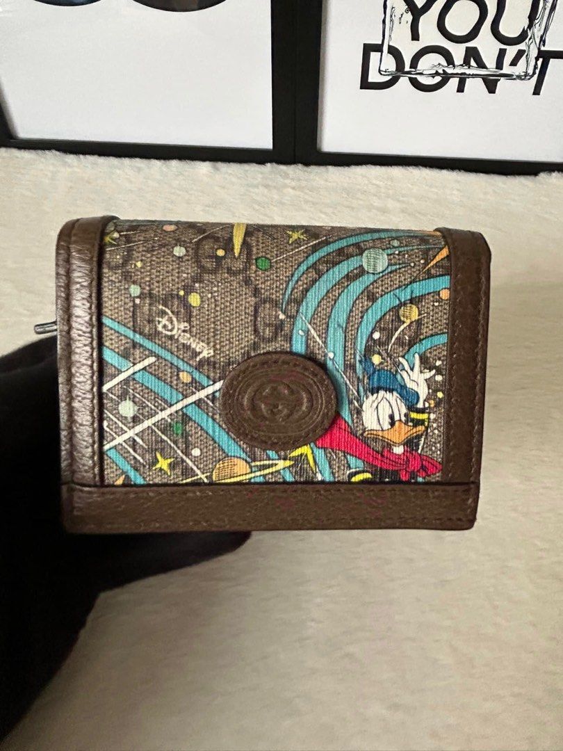 Gucci x Disney Donald Duck (Category: Luxury Bags & Wallets) located in Manila. Submitted by bagislifeshop (Listing ID 1232485259, Image 2). Description: ▪️Gucci x Disney Donald Duck▪️ ☑️Available in Pampanga ✅Condition: 9/10 ✅Colour: Beige and Ebony ✅Material: Supreme canvas & leather trim ✅Inclusion: Dust bag, receipt, box and ribbon .