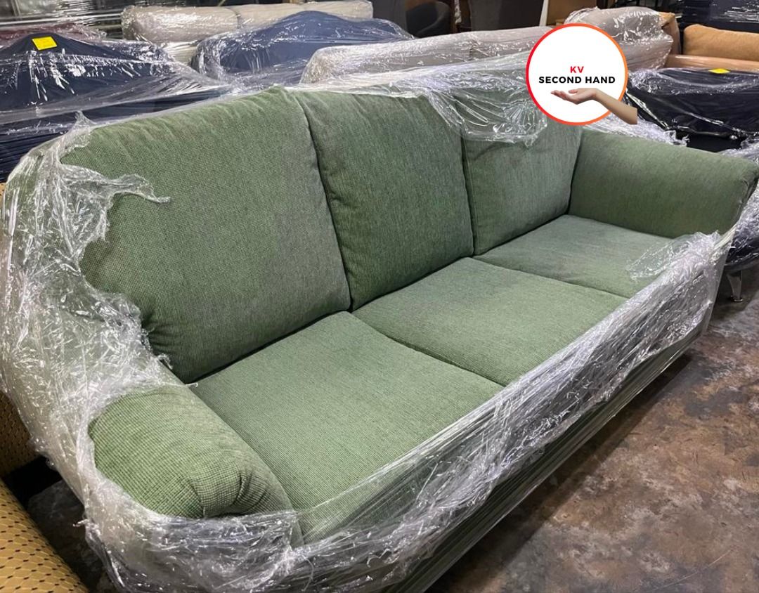Second hand sale green sofa