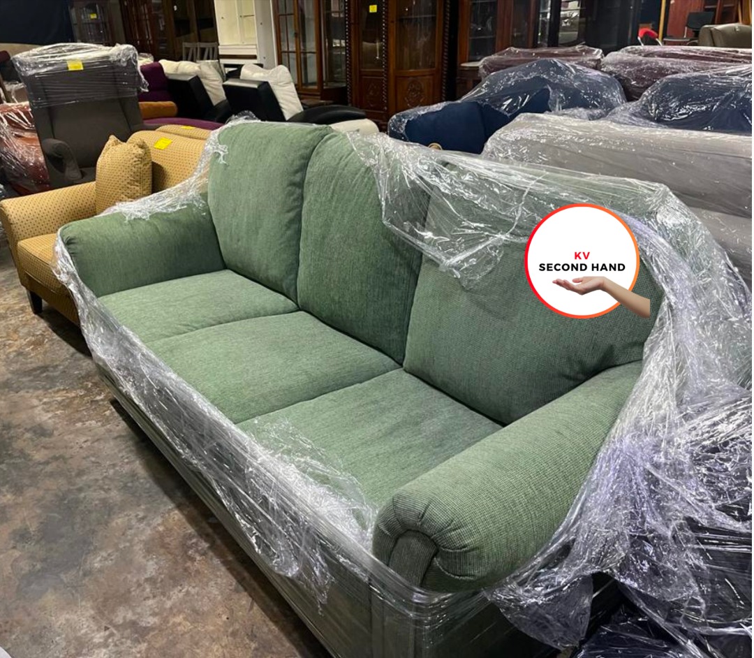 Second hand sale green sofa