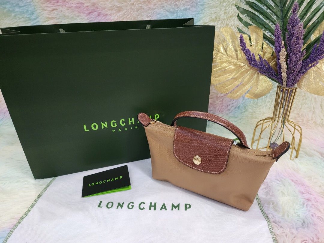 Longchamp Mini (Category: Luxury Bags & Wallets) located in Manila. Submitted by authenticoutletfindsph (Listing ID 1232474211, Image 3). Description: 4900 bag 1500 strap (generic only) Bag with outlet price tag. can send you photos to check..