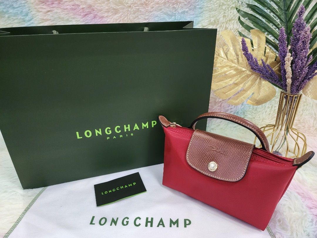 Longchamp Mini (Category: Luxury Bags & Wallets) located in Manila. Submitted by authenticoutletfindsph (Listing ID 1232474211, Image 2). Description: 4900 bag 1500 strap (generic only) Bag with outlet price tag. can send you photos to check..