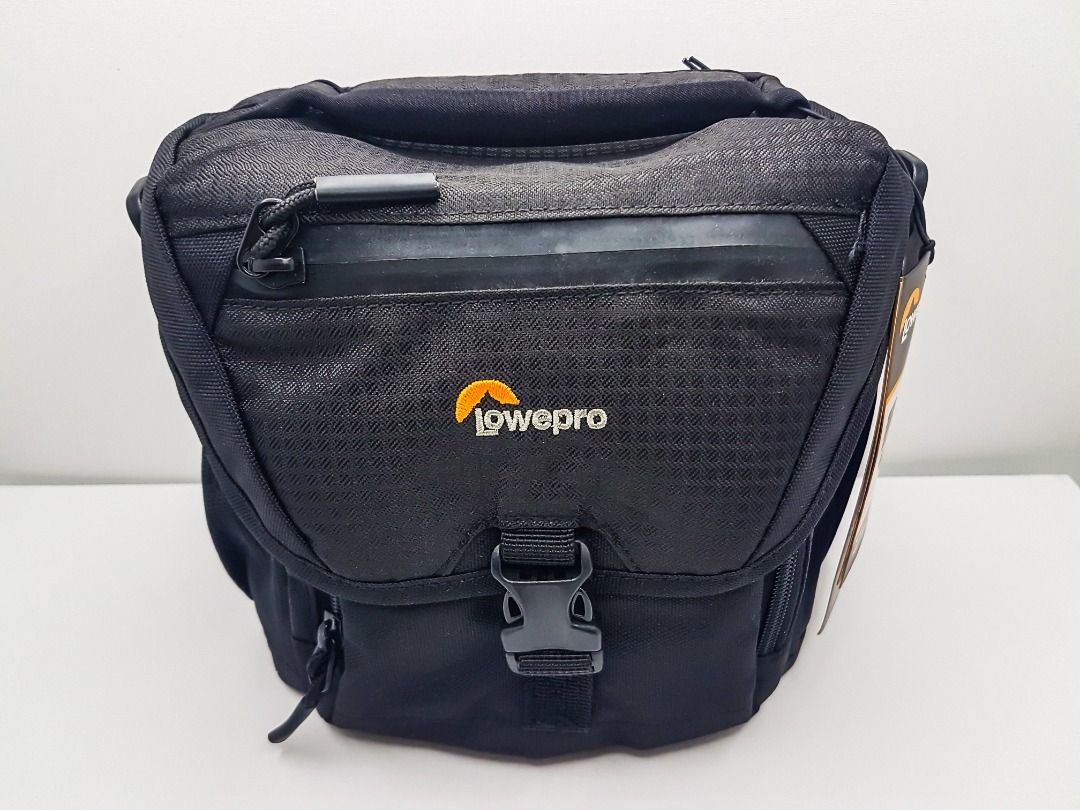 Lowepro Nova 140 AW II Camera Shoulder Bag (Category: Camera Bags & Carriers) located in Manila. Submitted by hommie888 (Listing ID 1232482512, Image 2). Description: Bought from US. Never been used. We're decluttering kaya we're selling it na lang. You may use Google to check the item's specs. Still a bit negotiable. Message us for inquiries. Thank you and God bless..