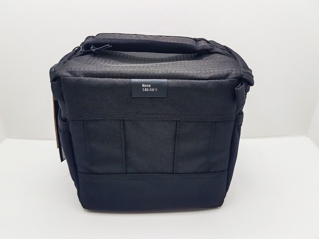 Lowepro Nova 140 AW II Camera Shoulder Bag (Category: Camera Bags & Carriers) located in Manila. Submitted by hommie888 (Listing ID 1232482512, Image 3). Description: Bought from US. Never been used. We're decluttering kaya we're selling it na lang. You may use Google to check the item's specs. Still a bit negotiable. Message us for inquiries. Thank you and God bless..