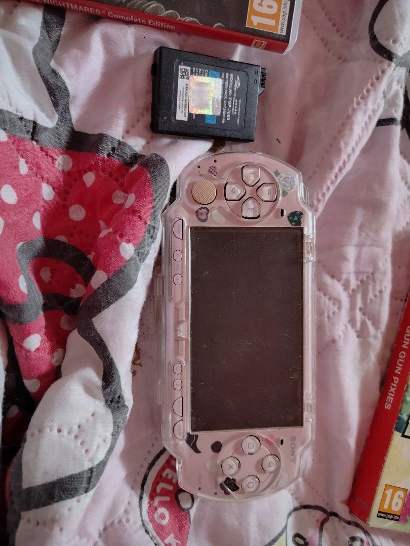 Psp pink edition (Category: PlayStation) located in Bacoor. Submitted by monocoward (Listing ID 1232381048, Image 2). Description: has a few dead pixels has also been jail broken comes with a sd card and case buyer must be the one to book it if needed price is negotiable.