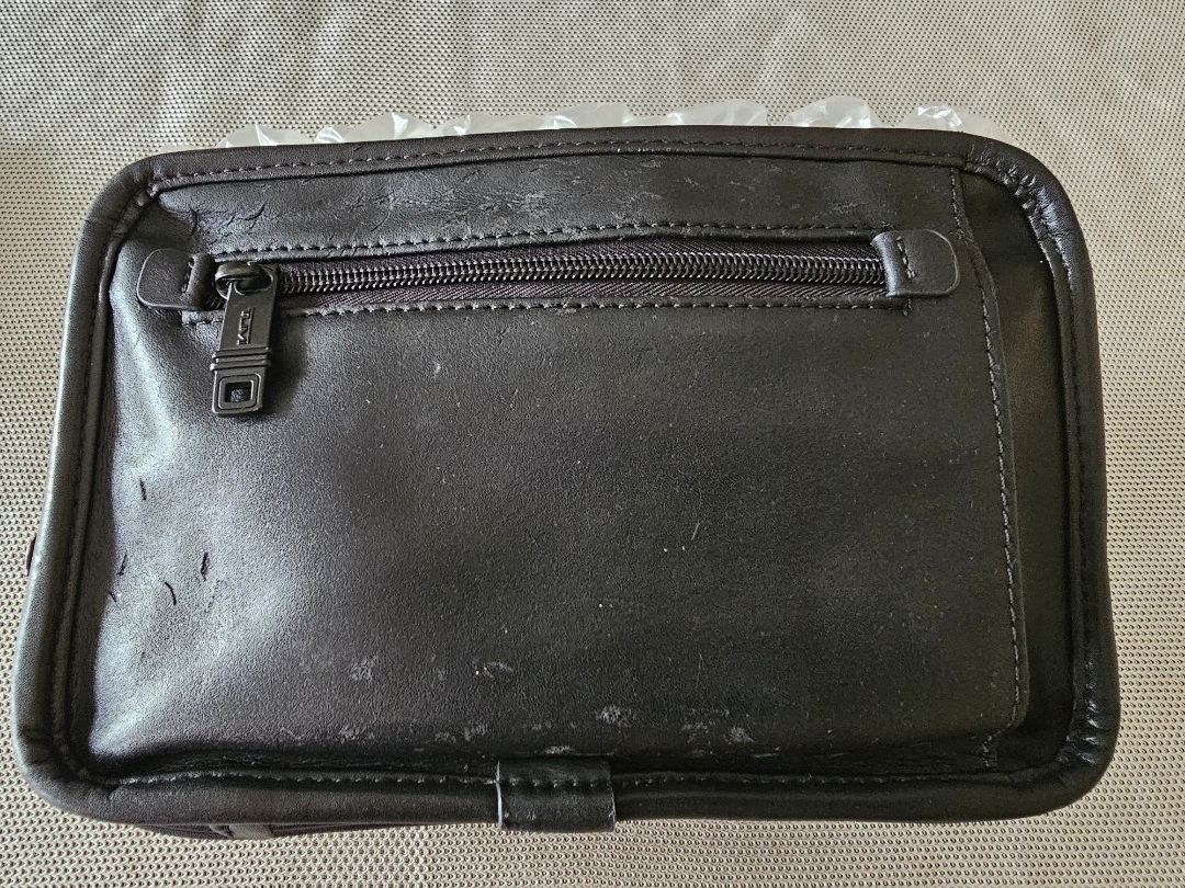 Tumi clutch wallet hot sale