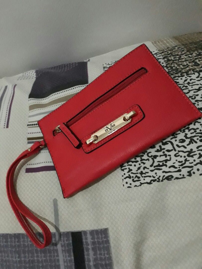 Versace Wrist Wallet (Category: Luxury Bags & Wallets) located in Legazpi City. Submitted by buyfrommaria (Listing ID 1232417315, Image 3). Description: Preloved Versace 19V69 Red Wrist Wallet. Still in great condition. Payment first basis thru gcash or bank transfer. Shipping thru LBC. Shipping c/o buyer.
