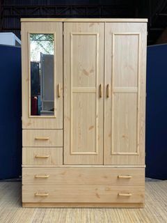 3-Door Wardrobe 46”L x 23”W x 70”H  3 wooden doors 4 pullout drawers In good condition