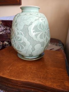 Celadon vase with floral motif