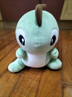 green dinosaur soft toy