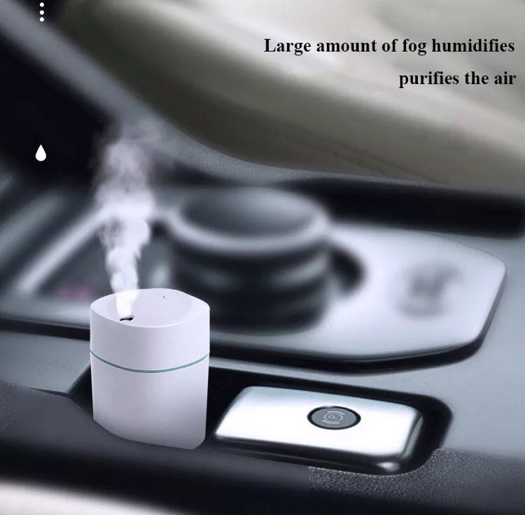 SALE Mini portable humidifier mist essential oil diffuser (Category: Air Purifiers & Dehumidifiers) located in Manila. Submitted by theconstantdeclutterer (Listing ID 1232608970, Image 3). Description: Old stock but tested. USB powered white humidifier essential oil mist diffuser. With free cotton swab. 220ml capacity. Benefits breathing, moisturizes face and add moisture to dry air. Has minor inner stains and filter is taped up but overall works
