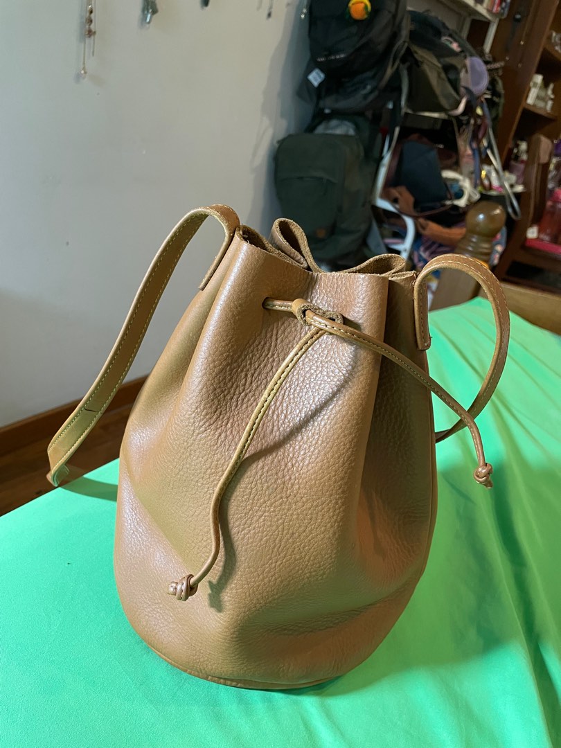 Wheel XS drawstring bucket bag, Women's Fashion, Bags & Wallets, Cross-body  Bags on Carousell