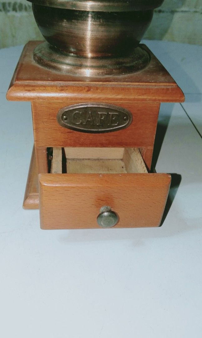 Vintage wooden coffee grinder (Category: Coffee Machines & Makers) located in Davao. Submitted by bravemoon_556cd5 (Listing ID 1232580953, Image 3). Description: Pre own from US from US we ship nationwide gcash or pay Maya or Bank account payment mode.