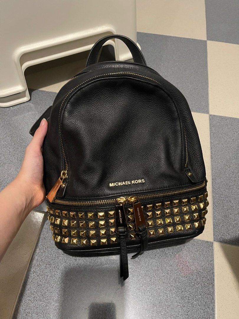 Michael kors black shop backpack with gold studs