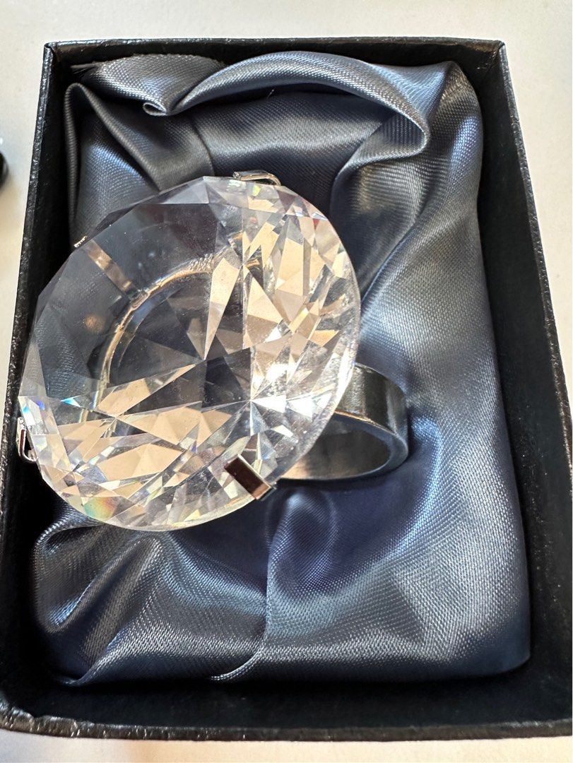 Giant fake diamond ring hot sale