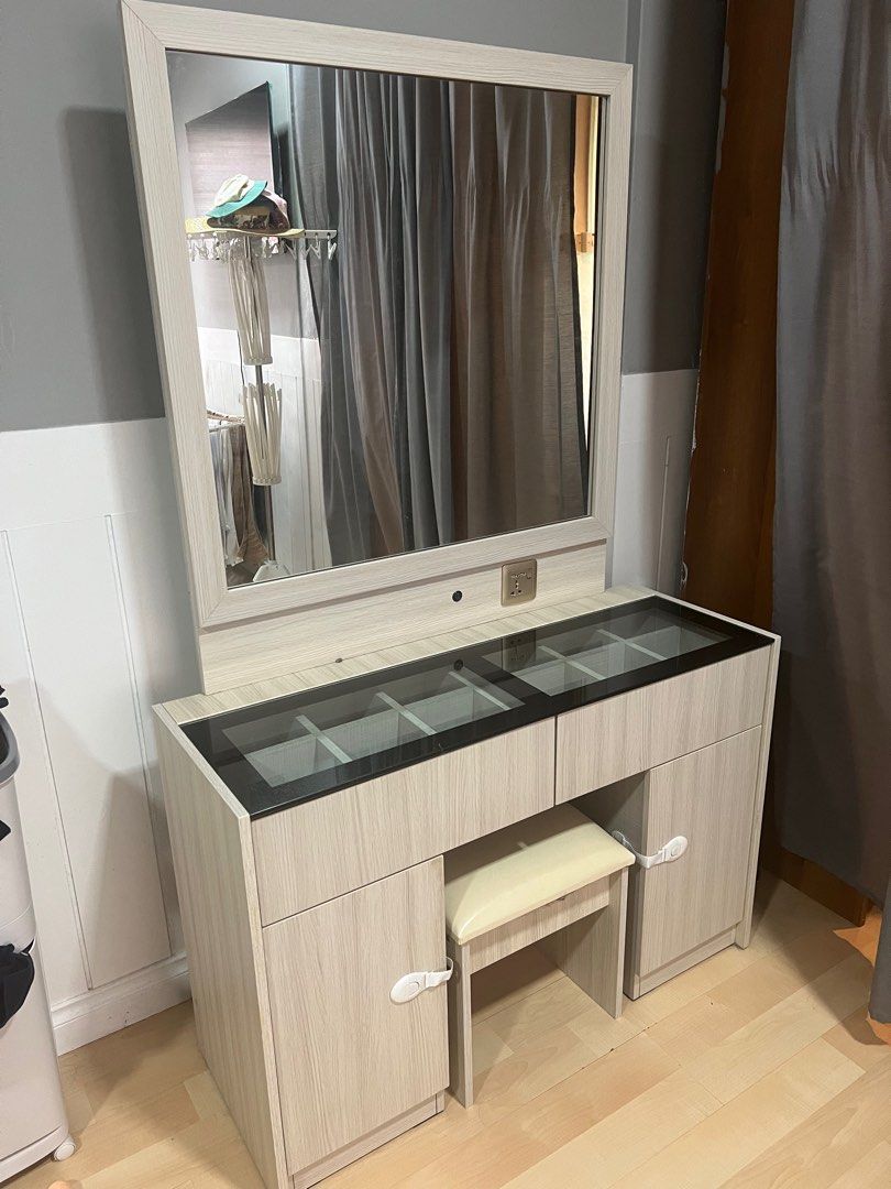 Dressing table with chair and transparent glass