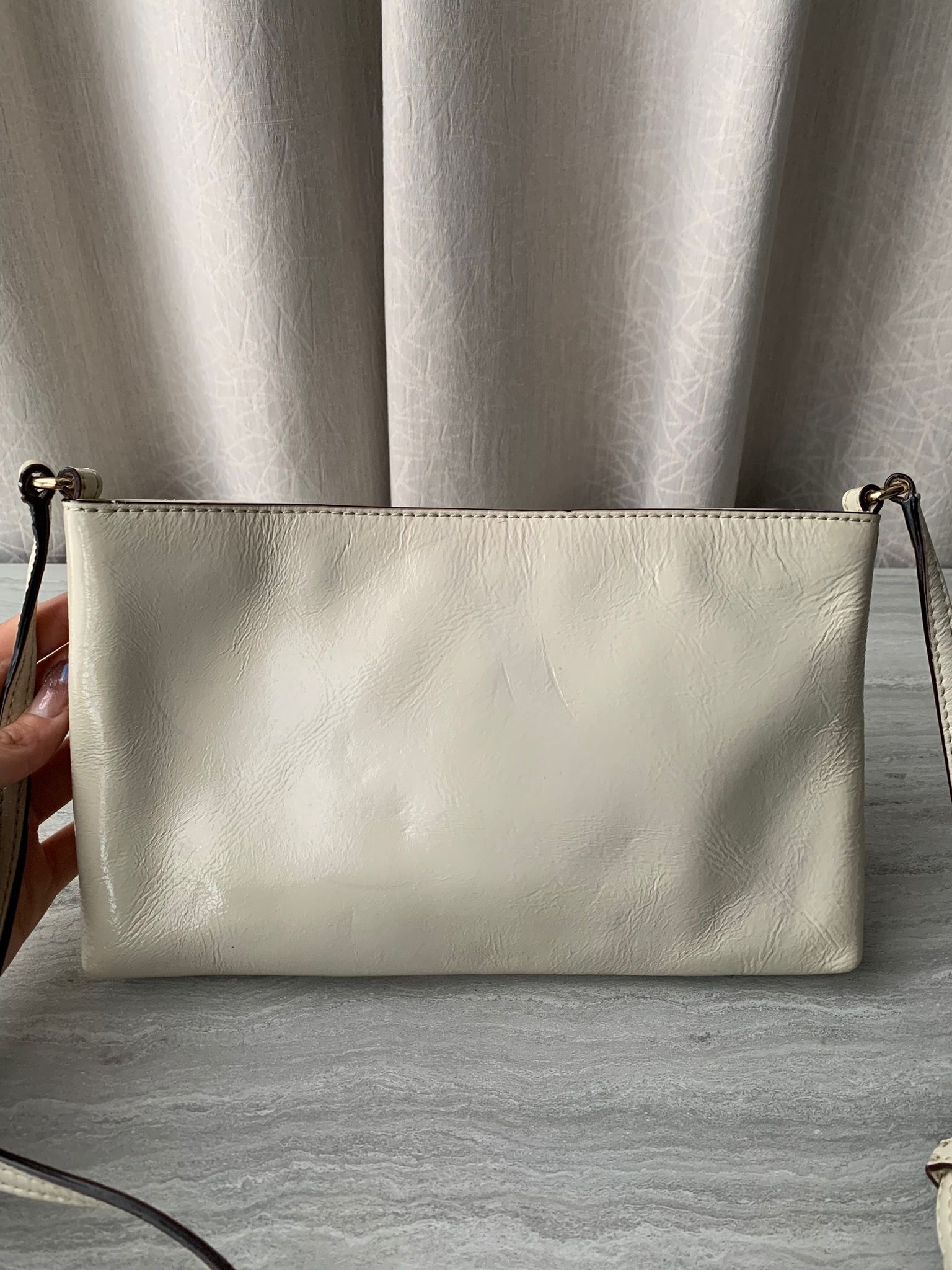 White patent leather clutch sales