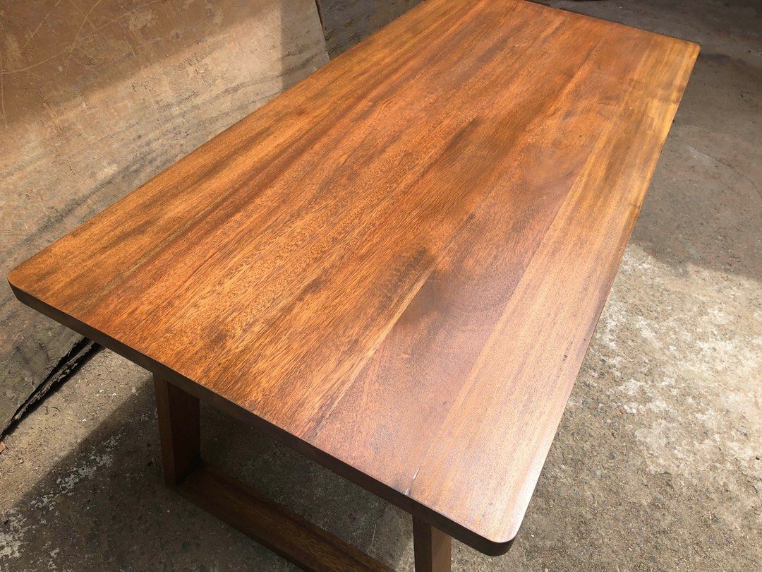 Modern Hardwood Dining Table (Category: Tables & Sets) located in Pasig City. Submitted by holzph (Listing ID 1232790256, Image 3). Description: Showcasing our modern designed piece. This solid wooden Mahogany table sits 6 people. 🌳 Table Measurements: Length: 180cm / 5’11” Width: 84cm / 33” Height: 74cm / 30” Thickness: 3.8cm / 1.5” Our table & benches can be customized based on your requirements. . . 100% Mahogany Wood 🌳 First come, first ser