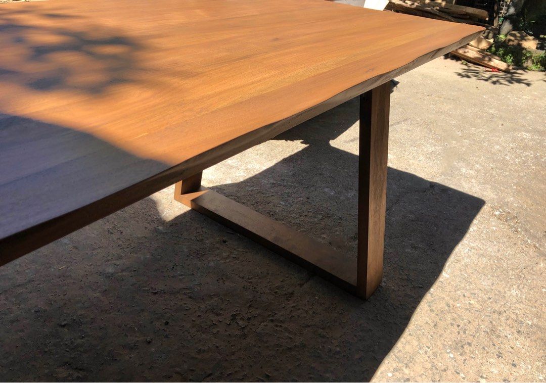 Modern Hardwood Dining Table (Category: Tables & Sets) located in Pasig City. Submitted by holzph (Listing ID 1232790256, Image 2). Description: Showcasing our modern designed piece. This solid wooden Mahogany table sits 6 people. 🌳 Table Measurements: Length: 180cm / 5’11” Width: 84cm / 33” Height: 74cm / 30” Thickness: 3.8cm / 1.5” Our table & benches can be customized based on your requirements. . . 100% Mahogany Wood 🌳 First come, first ser